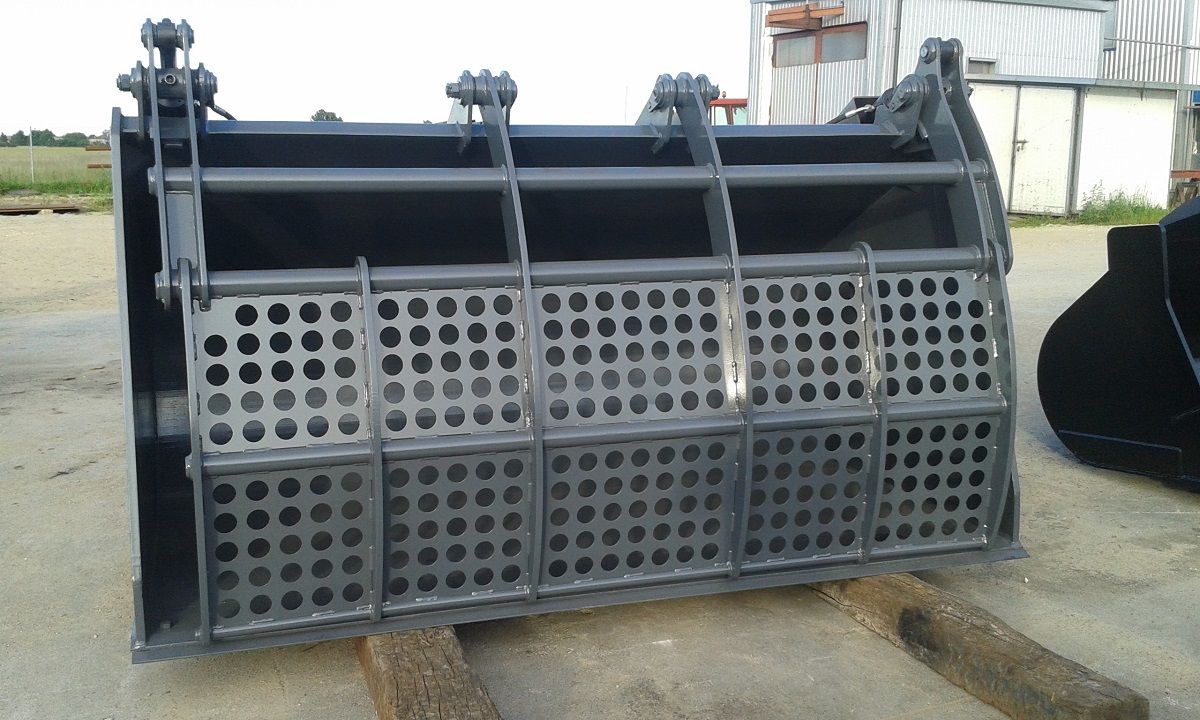 Accessoire pour chargeuse avec système de compactage