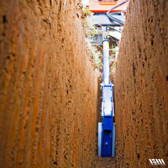 Trancheuse de sol avec vis sans fin pour déblais propres