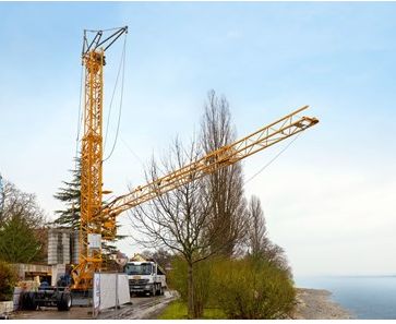Grue de chantier 34 K avec dispositif de télescopage rapide