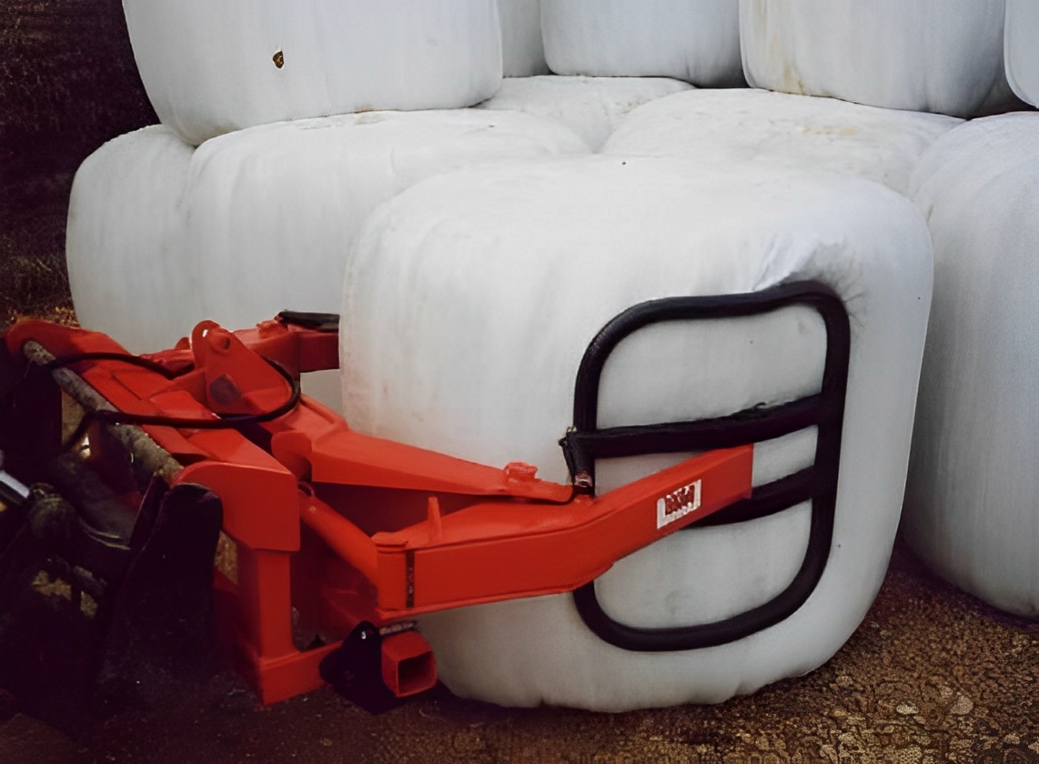 Appareil avec pinces arrondies pour protéger le film enrubanné