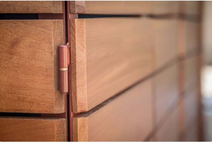 Solution esthétique pour protéger bacs à déchets