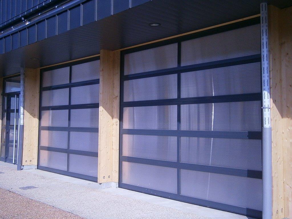 Porte sectionnelle industrielle cristal/manuel/semi-vitrée/en panneau sandwich_2