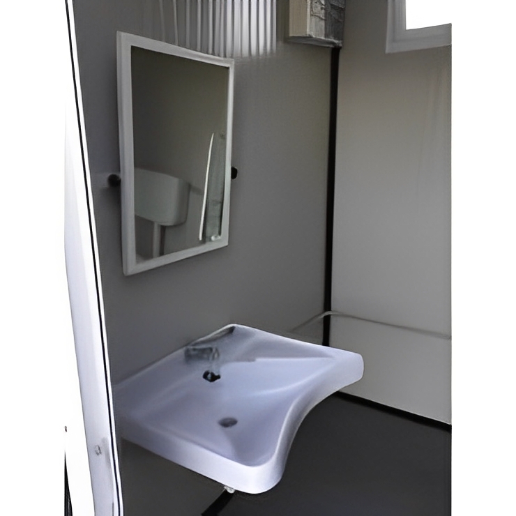 Cabine sanitaire pour chantier avec portes équipées de barres anti-panique