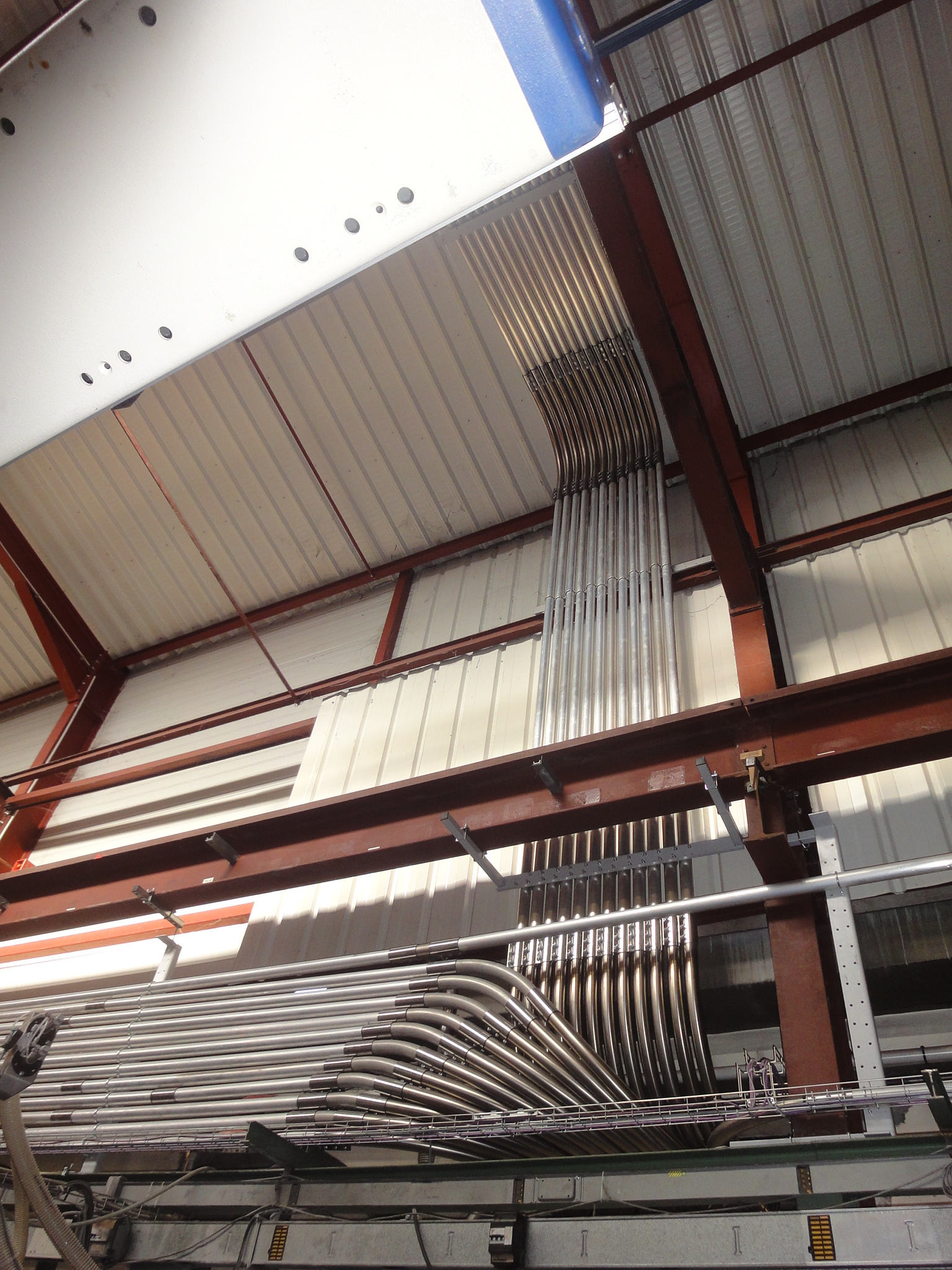 Transfert matière automatisé pour parc machine