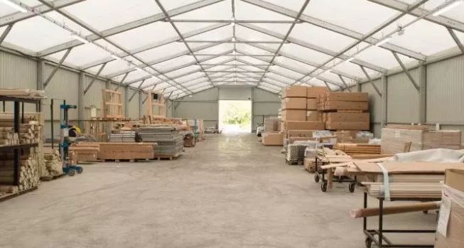 Bâtiment ou auvent pour le stockage en vrac de matière première ou matériaux en grand volume - Neivalu_2