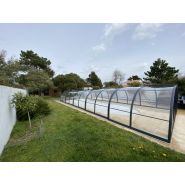 Abri de piscine motorisable avec porte latérale