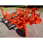 Butteuse dérouleuse équipée de disques réglables et rouleau frein