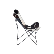 Fauteuil en cuir Loulou - Peau de vache noire et blanche - Design ethnique - Pieds en métal noir_2