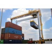 Grue portuaire - Liebherr - Portique de stockage sur pneus avec construction rigide et options de productivité_2