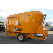 Machine agricole pour mélange avec distribution par trappe ou tapis