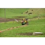 Dérouleuse avec rotor axial pour meilleure prise sur balles humides