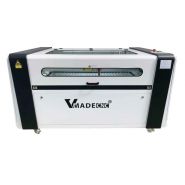 Vue latérale de la machine de découpe laser compacte CO2 1390