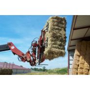 Outil agricole pour manutention de bottes rectangulaires avec rotation