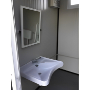 Cabine sanitaire avec système de sécurité visuel et sonore intégré