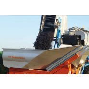 Remorque élévatrice pour vendange avec régulation de déchargement par vibration