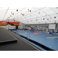 Bâtiments métallo-textiles industriels en arceaux treillis - portées jusqu'à 60m_2