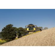 Cx6.90 laterale moissonneuse batteuse - new holland -trémie capacité / version hillside (l) 9 300_2