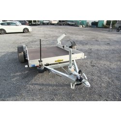 Remorque de qualité hors norme dotée d'un système hydraulique qui se pose au sol pour le transport d'une petite monoplace, une grosse moto - humbaur - hkt 4089 132515s