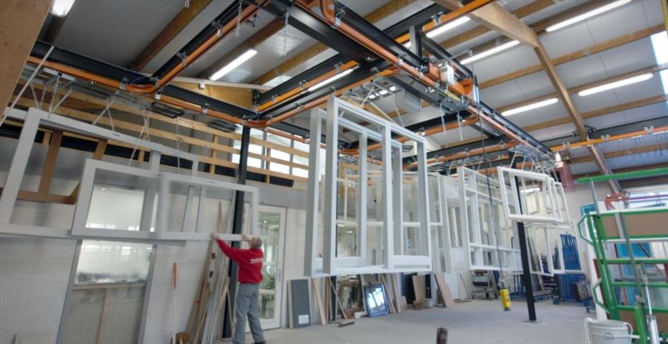 Convoyeur monorail manuel pour charges lourdes et configuration ergonomique