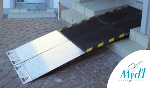Installation de rampe encastrée pour accessibilité en espace public
