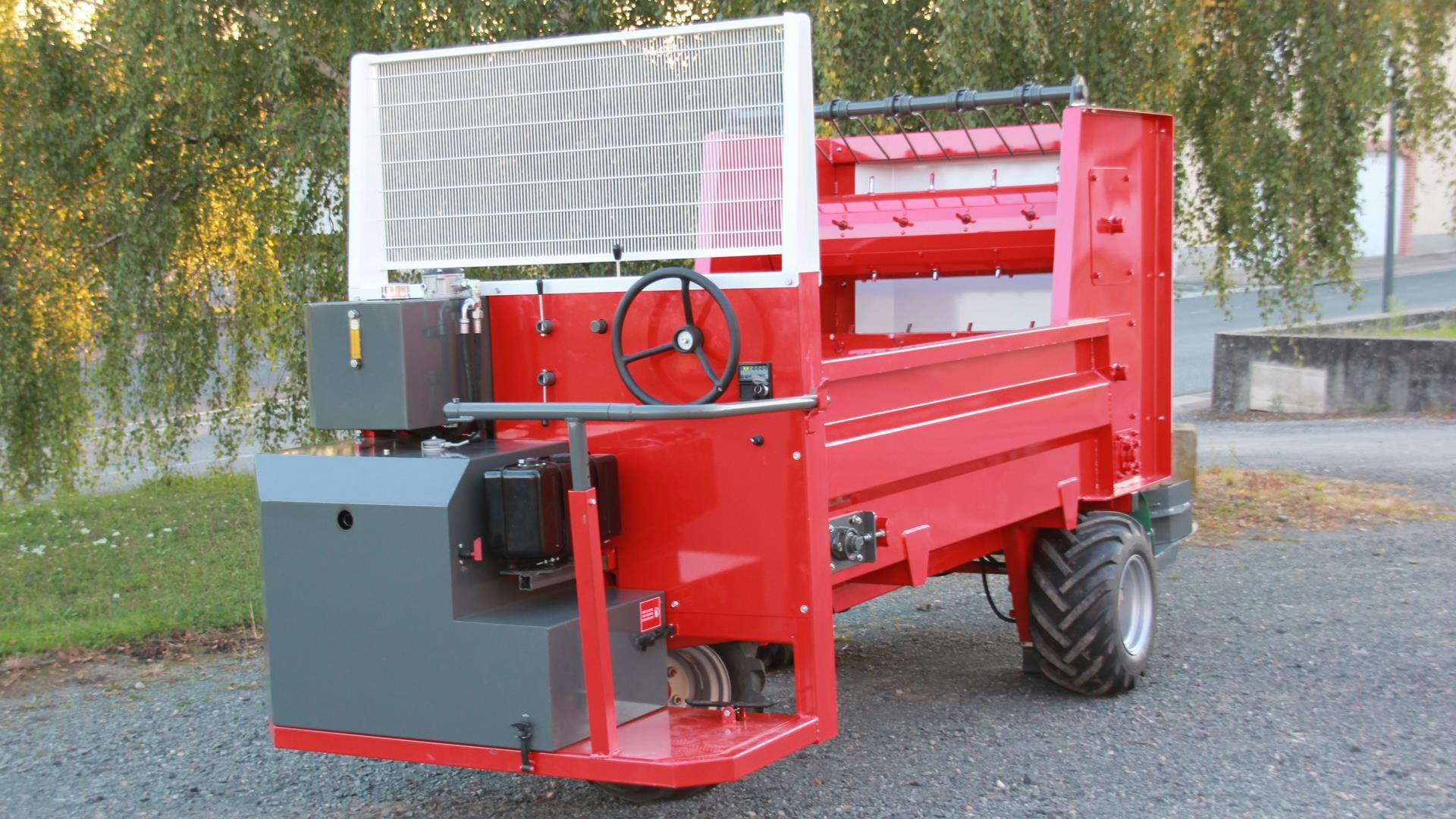 Dispositif de paillage réglable pour projection de paille en brins courts