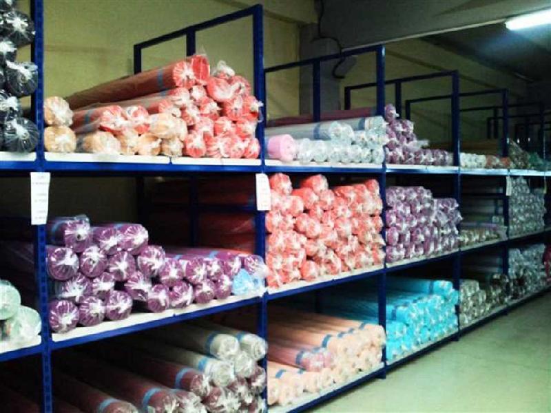 Stockage optimisé pour rouleaux de tissu