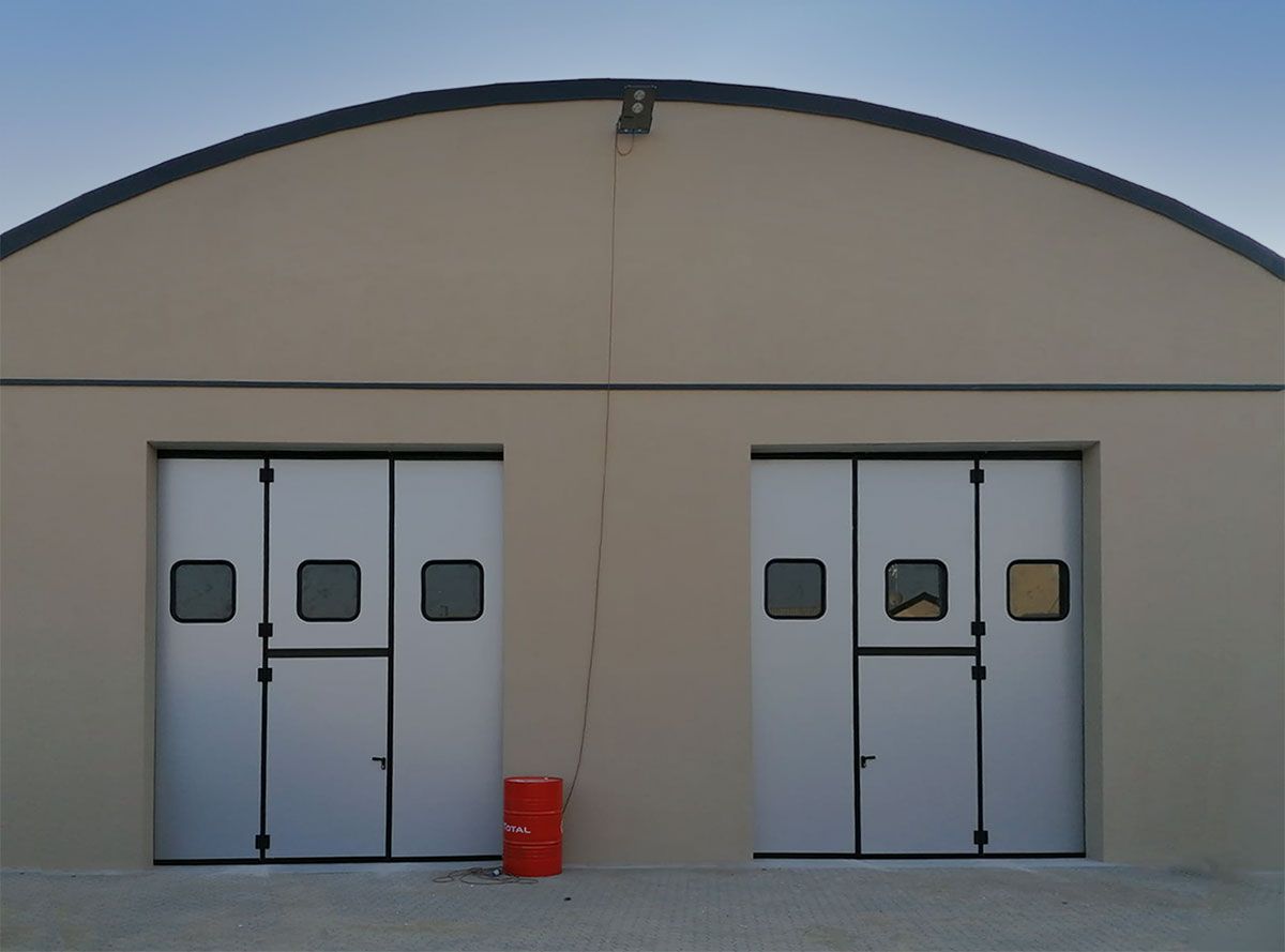 Porte pliante industrielle - Panneaux rigides anti-cambriolage - Hermétique et sécurisée_3