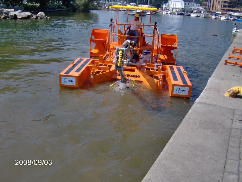 Pelles flottantes pour travaux de dragage_3