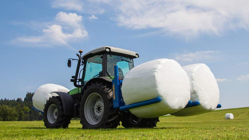 Transport simultané de balles rondes avec cadre robuste