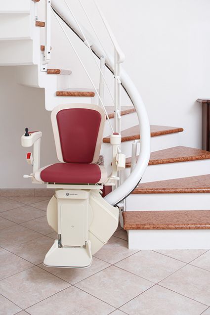 Monte-escalier monorail adapté aux escaliers arrondis - Handicare tournant Freecurve_1