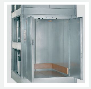 Monte-charges industriel avec moteur en haut ou en bas de la gaine