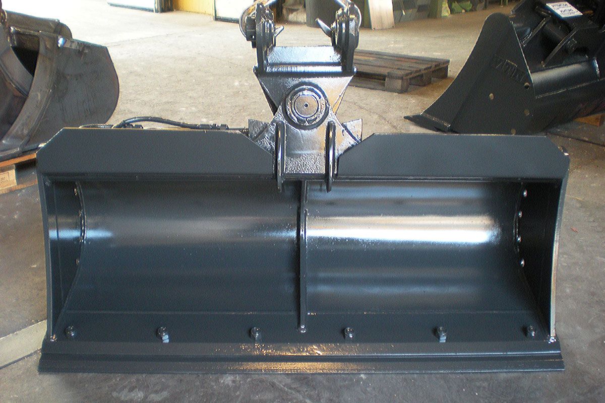 Godet de curage pivotant pour travaux hydrauliques