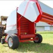 Machine à balles rondes adaptée à diverses conditions climatiques