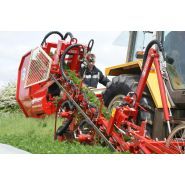 Récolteuse avec respect du produit grâce à chute amortie