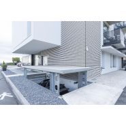 Équipement de levage pour voitures avec récupération d'eau de pluie