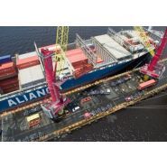 Solution de grue flottante pour opérations bord à quai