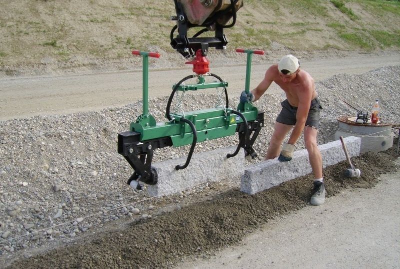 Outil pour manutention de pavés et dalles gazon