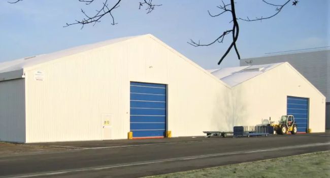 Bâtiment ou auvent pour le stockage en vrac de matière première ou matériaux en grand volume - Neivalu_3