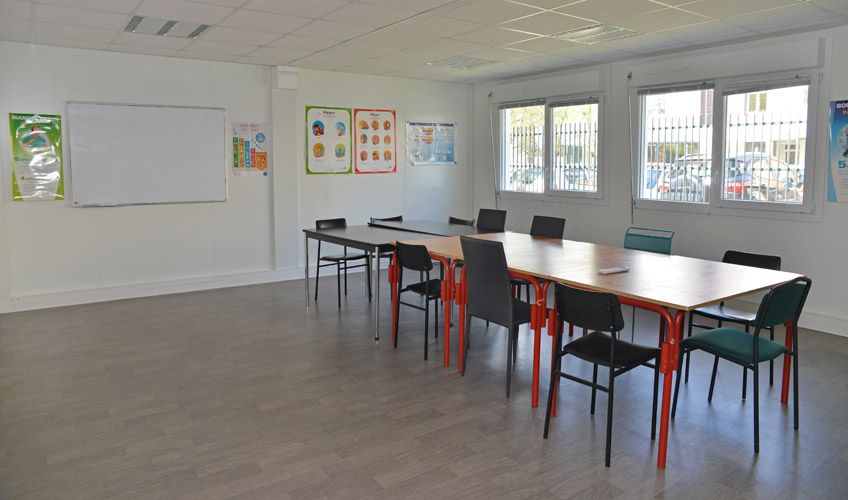 Constructions modulaires - Atemco - 118 m² avec bardage moderne orange et blanc_3