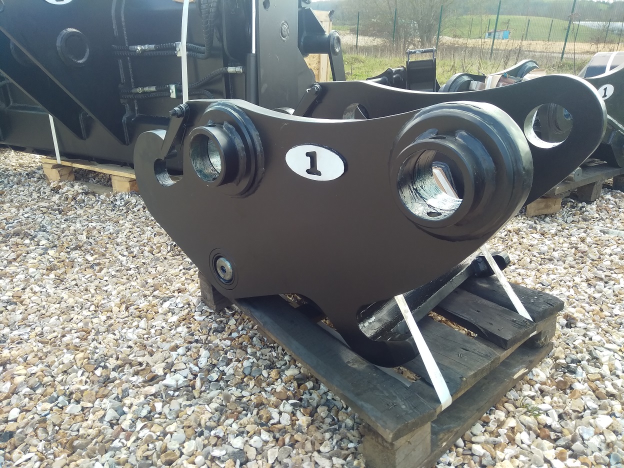 Système d'attache rapide pour pelles de chantier