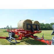 Remorque Anderson équipée d’un poussoir hydraulique pour balles