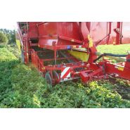 Machine équipée d'un tapis à doigts réglable pour une séparation optimale