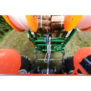 Système de cerclage de bûches avec ruban composite