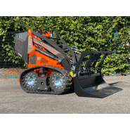 Chargeuse compacte équipée de chenilles et moteurs hydrauliques