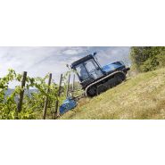 Tracteur New Holland TK4.80n adapté aux terrains extrêmes avec chenilles larges