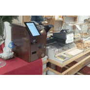 Borne de paiement avec coffre de stockage pour billets