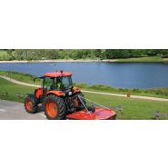 Machine de broyage avec caisson trapézoïdal pour une meilleure maniabilité