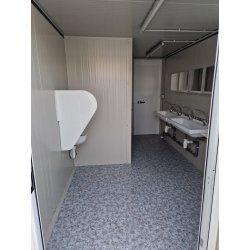 Bungalow sanitaire de chantier DX, avec 2 lavabos, 2 douches, 1 urinoir et 2 wc à l'anglaise - Jusqu'à 12-20 personnes