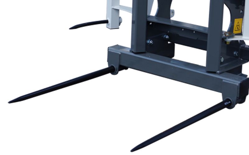 Outil de manutention avec rehausse coulissante pour balles supplémentaires