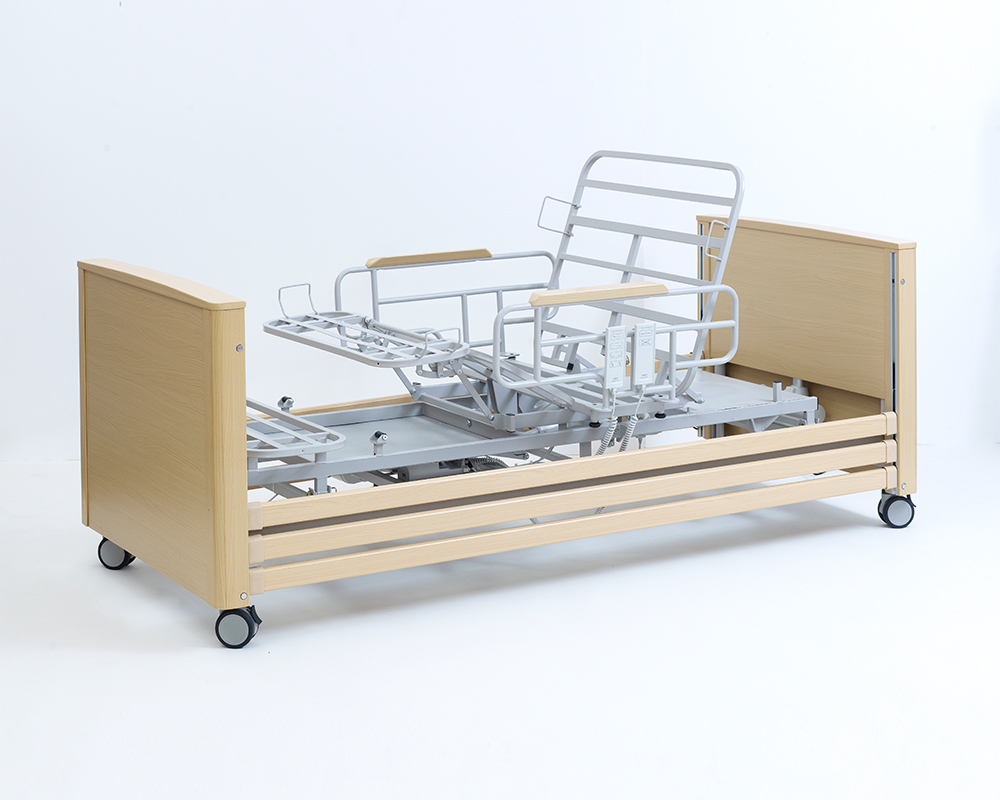 Lit médicalisé rotatif et releveur avec roues pivotantes équipées de freins
